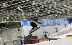 A snowboarder enjoys a run at Xanadu Snozone, the only indoor ski slope in Spain, located in Arroyomolinos near Madrid