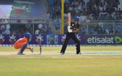 Afghan Cricket players from the Speen Ghar Tigers team (Orange) play against the Mis-e-Ainak Knights (Black) during Afghanistan's leading T20 cricket league 'Shpageeza' at the Kabul Cricket Stadium in Kabul, on August 22, 2024