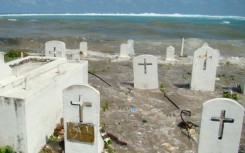 A cemetery on the shoreline in Majuro Atoll is flooded from high tides and ocean surges in the low-lying Marshall Islands, a Pacific atoll chain that rises barely a metre above sea level