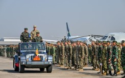 Senior Indonesian and US military officials inspect troops from their countries and eight others taking part in Super Garuda Shield joint military exercises in Sidoarjo, East Java