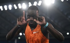 Botswana's Letsile Tebogo celebrates after winning the men's 100m in Rome