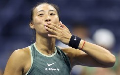 Queen of the night: Zheng Qinwen celebrates her win over Donna Vekic 