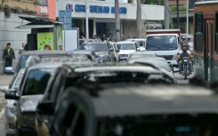 Drivers in Caracas queued up for gas during the nationwide blackout 