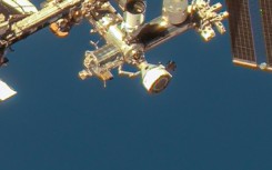 This handout image courtesy of Maxar Technologies taken on June 7, 2024 shows the Boeing Starliner spacecraft docked with the International Space Station's (ISS) forward port on the station's Harmony module