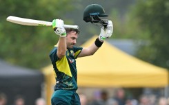 Rapid hundred: Australia's Josh Inglis celebrates his century during the second T20 against Scotland in Edinburgh