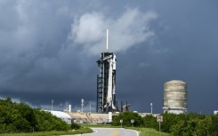 A SpaceX Falcon 9 rocket with the Crew Dragon Resilience capsule sits on Launch Complex 39A at Kennedy Space Center ahead of the Polaris Dawn Mission in Cape Canaveral, Florida