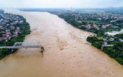 A section of bridge collapsed in Phong Chau in northern Vietnam, which was hit by serious flooding in the wake of Typhoon Yagi