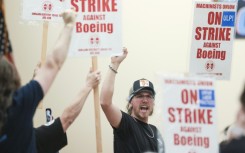 Boeing workers in the Seattle region overwhelmingly voted to strike and reject a contract 