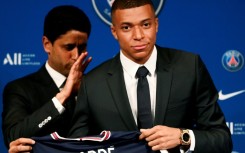 Paris Saint-Germain's CEO Nasser Al-Khelaifi and French forward Kylian Mbappe in happier times