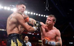 Saul 'Canelo' Alvarez lands a punch on the way to a unanimous decision victory over Edger Berlanga in their super middleweight world title bout