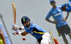 India's Virat Kohli bats in the nets during a practice session in Chennai ahead of their first Test against Bangladesh