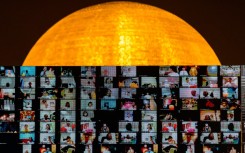 An online prayer at a temple in Thailand