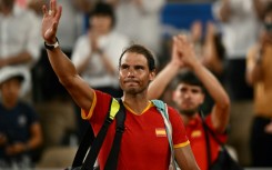 Rafael Nadal (L) and teammate Carlos Alcaraz after their elimination in the doubles at the Paris 2024 Olympics