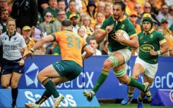 South Africa lock Eben Etzebeth (R) makes a charge against Australia in Brisbane during a 2024 Rugby Championship match.