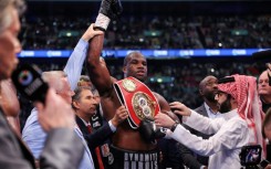 Britain's Daniel Dubois celebrates after defeating compatriot Anthony Joshua at Wembley to retain his IBF world heavyweight title