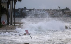 Waves crash onto St Pete Beach, Florida as Hurricane Helene churns offshore on September 26, 2024