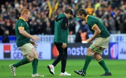 Eben Etzebeth (R) and Steven Kitshoff celebrate after South Africa beat New Zealand in the 2023 Rugby World Cup final in Paris.