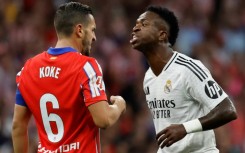 Real Madrid forward Vinicius Junior (R) is hoping to win the Ballon d'Or at the end of October