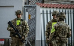 Danish military Police guard the   Israeli embassy in Copenhagen after two blasts went off nearby