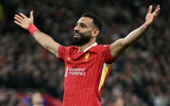 Liverpool's Mohamed Salah celebrates scoring against Bologna