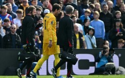 Liverpool goalkeeper Alisson Becker limped off late on