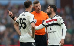 Defender Jonny Evans (left) helped Manchester United battle to a 0-0 draw against Aston Villa