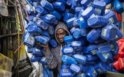 Ezedin Muste, 23, is one of thousands of waste collectors known in Amharic as 'korale' 