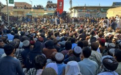 Labourers gather to protest against the killings of coal miners in an overnight attack in Duki district of Pakistan's southwestern Balochistan province