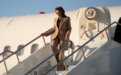 US Vice President and Democratic presidential candidate Kamala Harris steps off Air Force Two as she arrives in Phoenix, Arizona