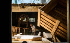 The coffin workshop in downtown Beira has a disused sawmill