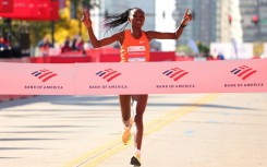 Ruth Chepngetich set a women's world record as she won the Chicago Marathon for a third time