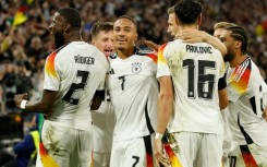 Germany's number seven Jamie Leweling celebrates with teammates after scoring against the Netherlands