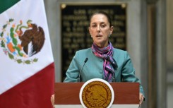 Mexican President Claudia Sheinbaum speaks after meeting foreign business leaders at the National Palace