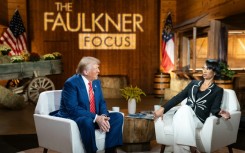 Donald Trump with Fox News broadcaster Harris Faulkner for a townhall event in Cumming, Georgia