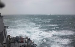 A handout photo taken on October 20 by the US Navy shows the USS Higgins (foreground) and Royal Canadian Navy frigate HMCS Vancouver in the Taiwan Strait