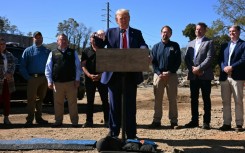 Former US President and Republican presidential candidate Donald Trump speaks to the media in Swannanoa, North Carolina, on October 21, 2024, after observing cleanup efforts in the aftermath of Hurricane Helene, which devastated the region 