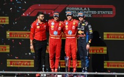 Victory line-up: Charles Leclerc and Carlos Sainz with Max Verstappen on the podium 
