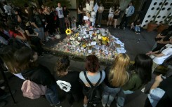 Fans have paid tribute to British singer Liam Payne in front of the hotel where he died in Buenos Aires 