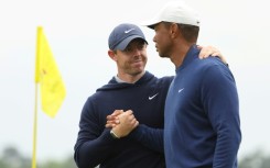 Northern Ireland's Rory McIlroy, left, and 15-time major winner Tiger Woods, right, could meet on January 27 in the inaugural season of the TGL under a debut campaign schedule