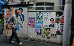 Candidates in Japan's super-tight election will make last-ditch appeals to voters on Saturday