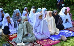 Around a hundred relatives, survivors and supporters gathered at the cemetery of a mosque in Narathiwat province on Friday morning to pray at a mass grave