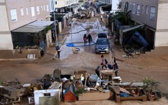 The floods have tossed vehicles, collapsed bridges and covered towns with mud