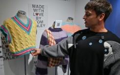 Retired British Olympic diving champion Tom Daley returned to Tokyo, where he won Olympic gold three years ago, to open a showcase of his knitting and crocheting