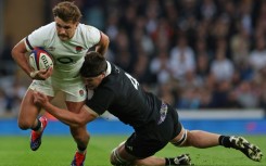 England's Henry Slade in action against New Zealand