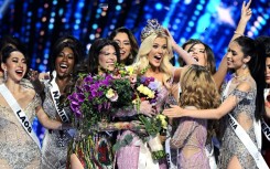 The newly crowned Miss Universe 2024, Victoria Kjaer Theilvig (C) from Denmark is a dancer and animal rights activist