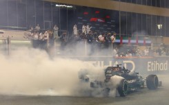 Lewis Hamilton does doughnuts after the Covid-19 affected season closer in Abu Dhabi - his seventh world title