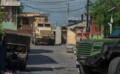 A Kenyan police armored vehicle patrols the Solino district in Port-au-Prince on November 16, 2024