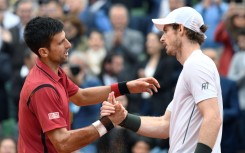 Novak Djokovic shakes hands with Andy Murray when the Briton was still playing -- he is now joining the Serb's coaching team