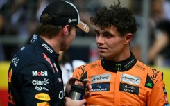 Lando Norris (R) said newly-crowned Formula One champion Max Verstappen deserved the title as he had not put a foot wrong