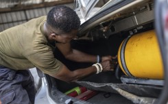 Faced with soaring petrol prices after an end to fuel subsidies, some Nigerians are convertng their cars to run on compressed natural gas